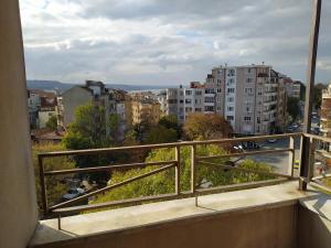a balcony with a view of a city at Hotel Elica in Varna City