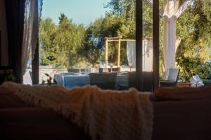 Posedenie v ubytovaní Villa Marmari