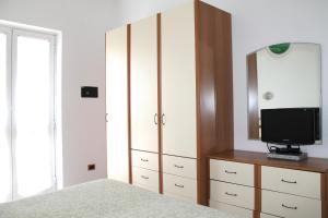 TV a/nebo společenská místnost v ubytování Hotel I 4 Assi