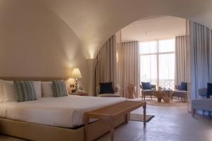 Voodi või voodid majutusasutuse Liwa Hotel toas