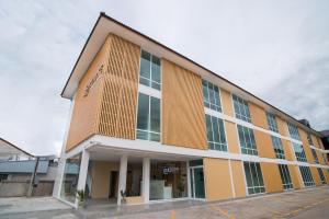a large building with a lot of windows at La Route Residence Pattaya in Pattaya North