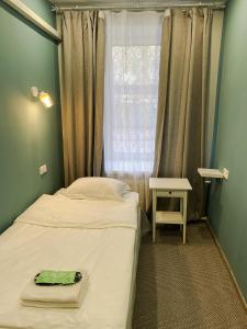 
Кровать или кровати в номере Hotel Sultan-3 on Belorusskaya
