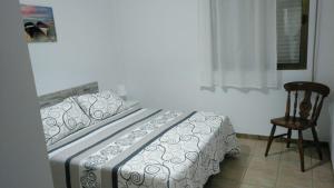 Postel nebo postele na pokoji v ubytování Junto al Mar