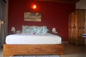 Postel nebo postele na pokoji v ubytování Exotic Guest House
