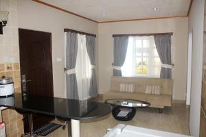 Posezení v ubytování Exotic Guest House