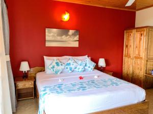 Postel nebo postele na pokoji v ubytování Exotic Guest House