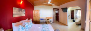 Postel nebo postele na pokoji v ubytování Exotic Guest House
