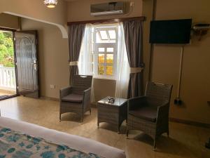 TV a/nebo společenská místnost v ubytování Exotic Guest House