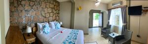TV a/nebo společenská místnost v ubytování Exotic Guest House