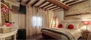 Posteľ alebo postele v izbe v ubytovaní Il Giardino sul Tetto B&B