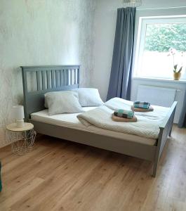 Postel nebo postele na pokoji v ubytování Apartmány Trio Horní Maršov