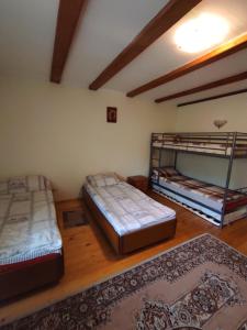 Ένα ή περισσότερα κρεβάτια σε δωμάτιο στο чарівний куточок