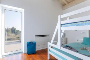 Katil atau katil-katil dalam bilik di Design Villa in Piedimonte Etneo