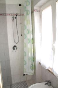 Koupelna v ubytování Hotel I 4 Assi