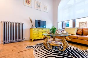 TV a/nebo společenská místnost v ubytování Singular loft en los pinares de Covaleda, Soria
