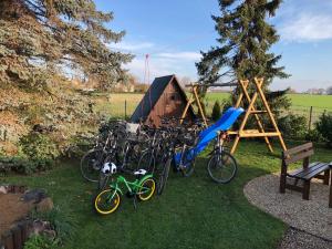 a group of bikes parked next to a playground at Ferienwohnungostseeblick in Börgerende-Rethwisch