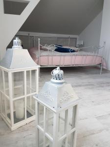 Ένα ή περισσότερα κρεβάτια σε δωμάτιο στο Apartament Krystyna II