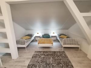 Ένα ή περισσότερα κρεβάτια σε δωμάτιο στο Apartament Krystyna II