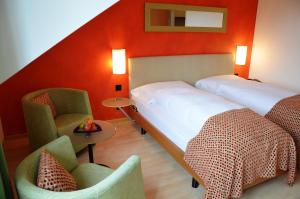 Voodi või voodid majutusasutuse Hotel Urs und Viktor toas