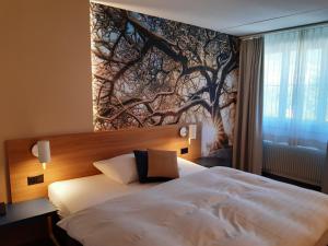 Voodi või voodid majutusasutuse Hotel Urs und Viktor toas