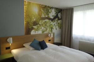 Voodi või voodid majutusasutuse Hotel Urs und Viktor toas