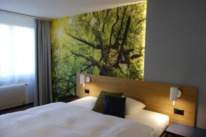 Voodi või voodid majutusasutuse Hotel Urs und Viktor toas