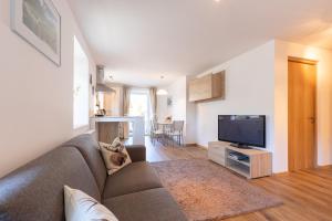 A television and/or entertainment centre at Appartments zum Beck
