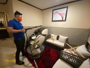 Posezení v ubytování Amax Inn Makati