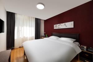 Кровать или кровати в номере Spring Time Hostel