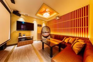 TV a/nebo společenská místnost v ubytování HOTEL Lotus Shibuya (Adult Only)