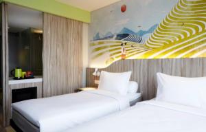 Letto o letti in una camera di ibis Styles Bandung Grand Central
