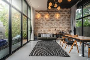 Istumisnurk majutusasutuses Aleenta Hua Hin - Pranburi - The Small Luxury Hotels of the World