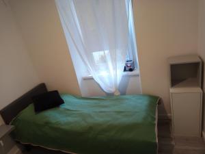 Posteľ alebo postele v izbe v ubytovaní Apartament na Zakręcie