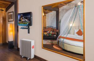 TV a/nebo společenská místnost v ubytování Honeymoon Inn Manali