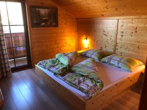 Posteľ alebo postele v izbe v ubytovaní Wilderer Alm Chalet Katschberg