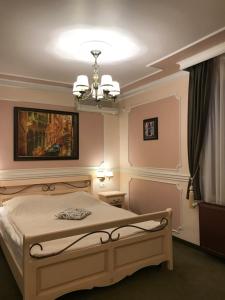 Postel nebo postele na pokoji v ubytování Hotel Parc Tecuci + 86 fotografií