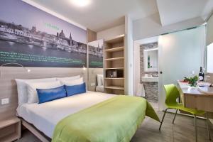 Postel nebo postele na pokoji v ubytování Hotel Santana