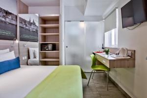 Postel nebo postele na pokoji v ubytování Hotel Santana