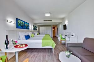Postel nebo postele na pokoji v ubytování Hotel Santana