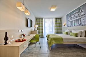 TV a/nebo společenská místnost v ubytování Hotel Santana