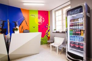 a room filled with lots of different types of refrigerators at Moon Hostel in Gdańsk