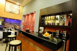 The lounge or bar area at Hotel Osam