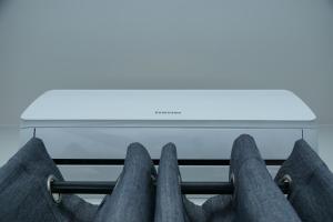 a row of hangers in front of a television at Greyville Apartments in Lusaka