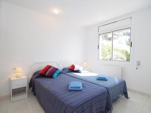 Postel nebo postele na pokoji v ubytování Holiday Home Prudenci by Interhome
