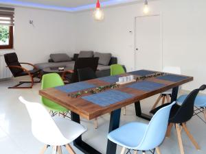 a dining room with a table and chairs at Holiday Home Starci - LBN406 by Interhome in Labin