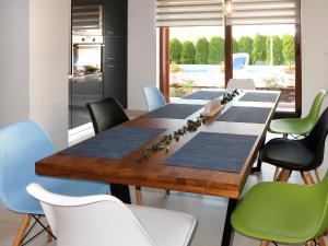 a dining room with a long table and chairs at Holiday Home Starci - LBN406 by Interhome in Labin