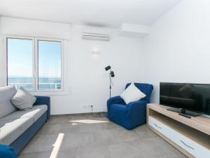TV a/nebo společenská místnost v ubytování Holiday Home Jeroni Pau by Interhome