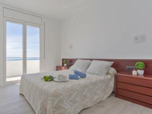 Postel nebo postele na pokoji v ubytování Holiday Home Jeroni Pau by Interhome