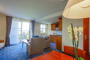 Istumisnurk majutusasutuses Balmer See – Hotel•Golf•Spa