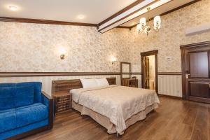 Säng eller sängar i ett rum på Villa Polianna